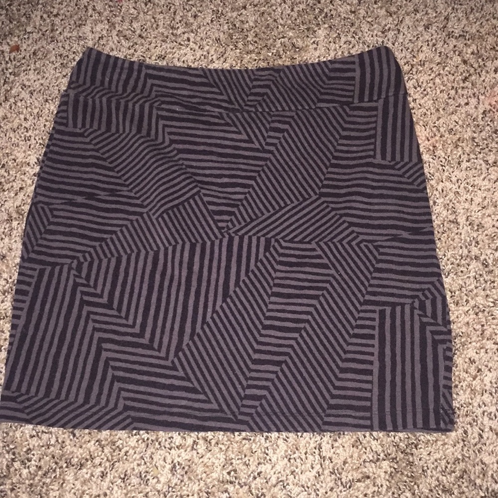 Grey and black skirt.